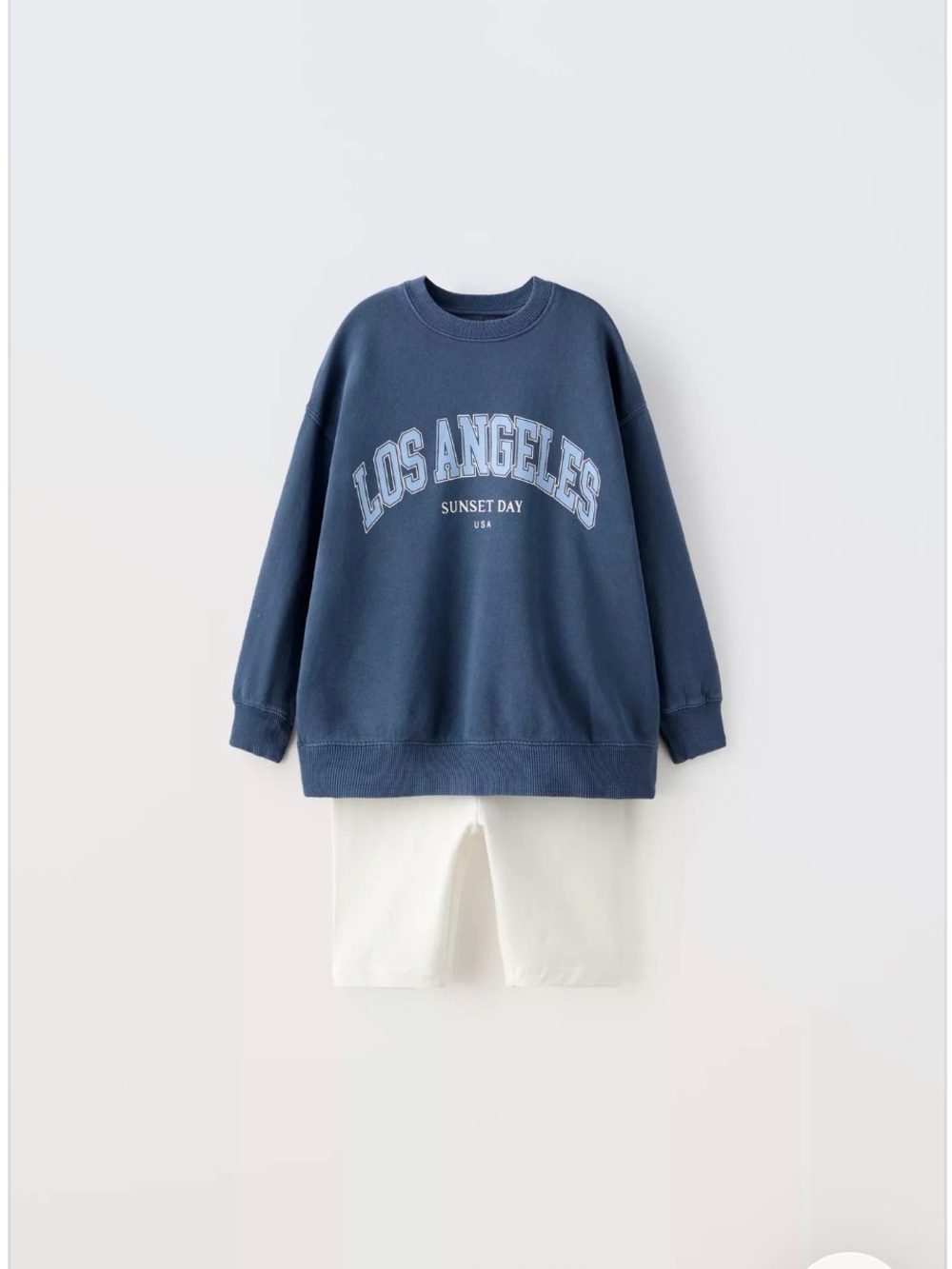 Zara Girl branded blue Los Angeles graphic top and white biker shorts set 10YE
